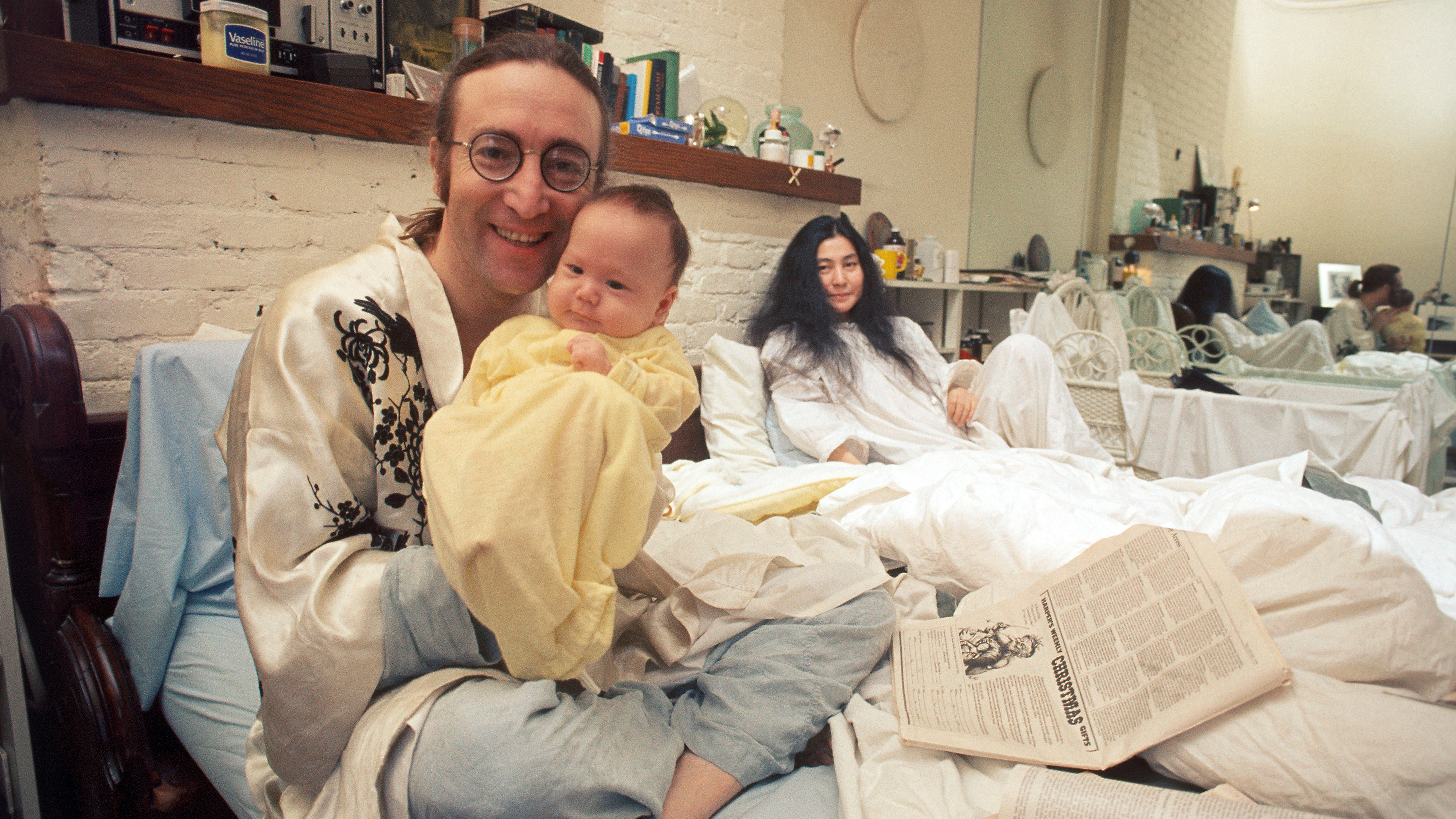 John Lennon with Yoko Ono and baby Sean, December 1975