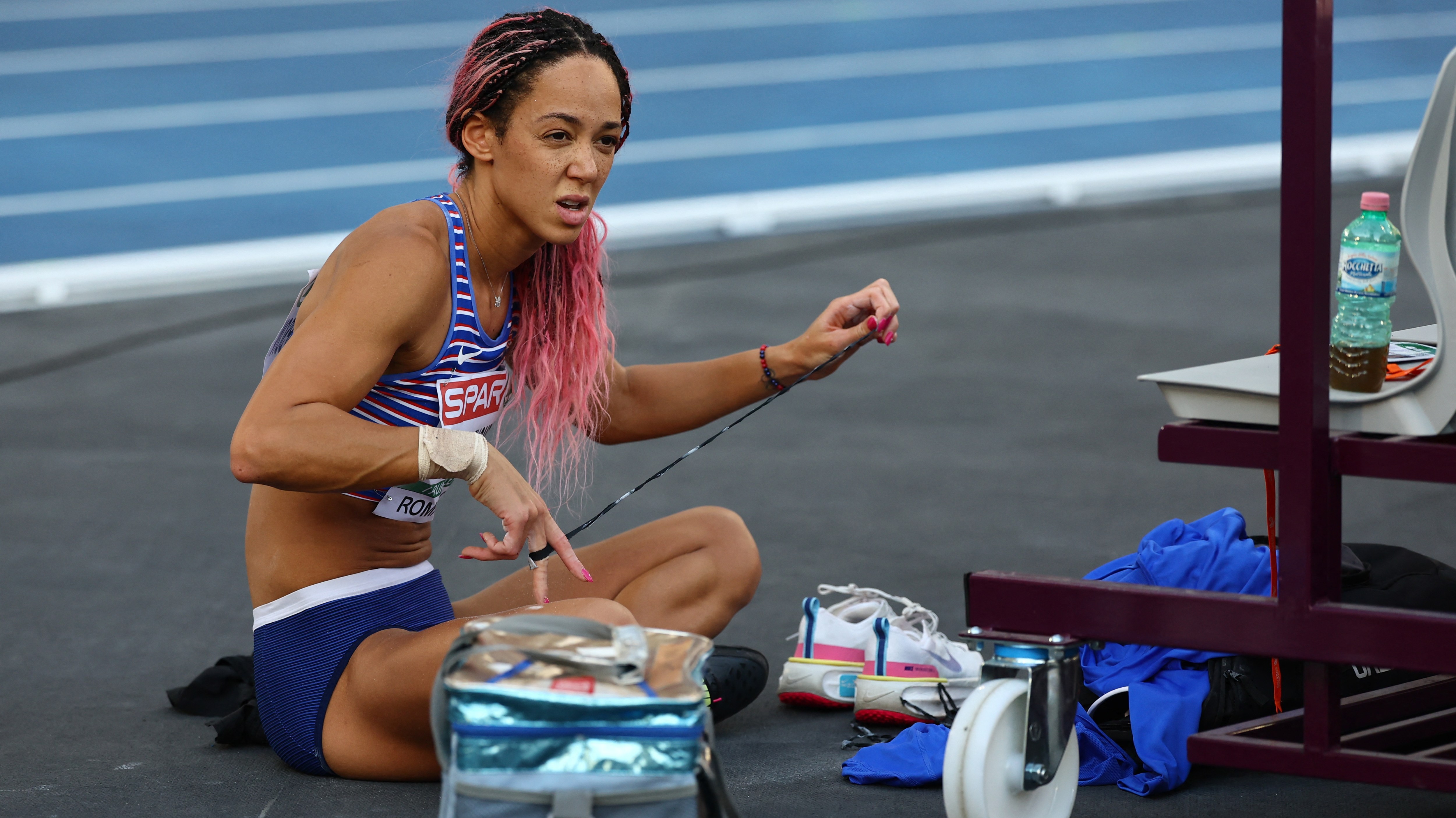 Johnson-Thompson was down in ninth when the news came that she was out
