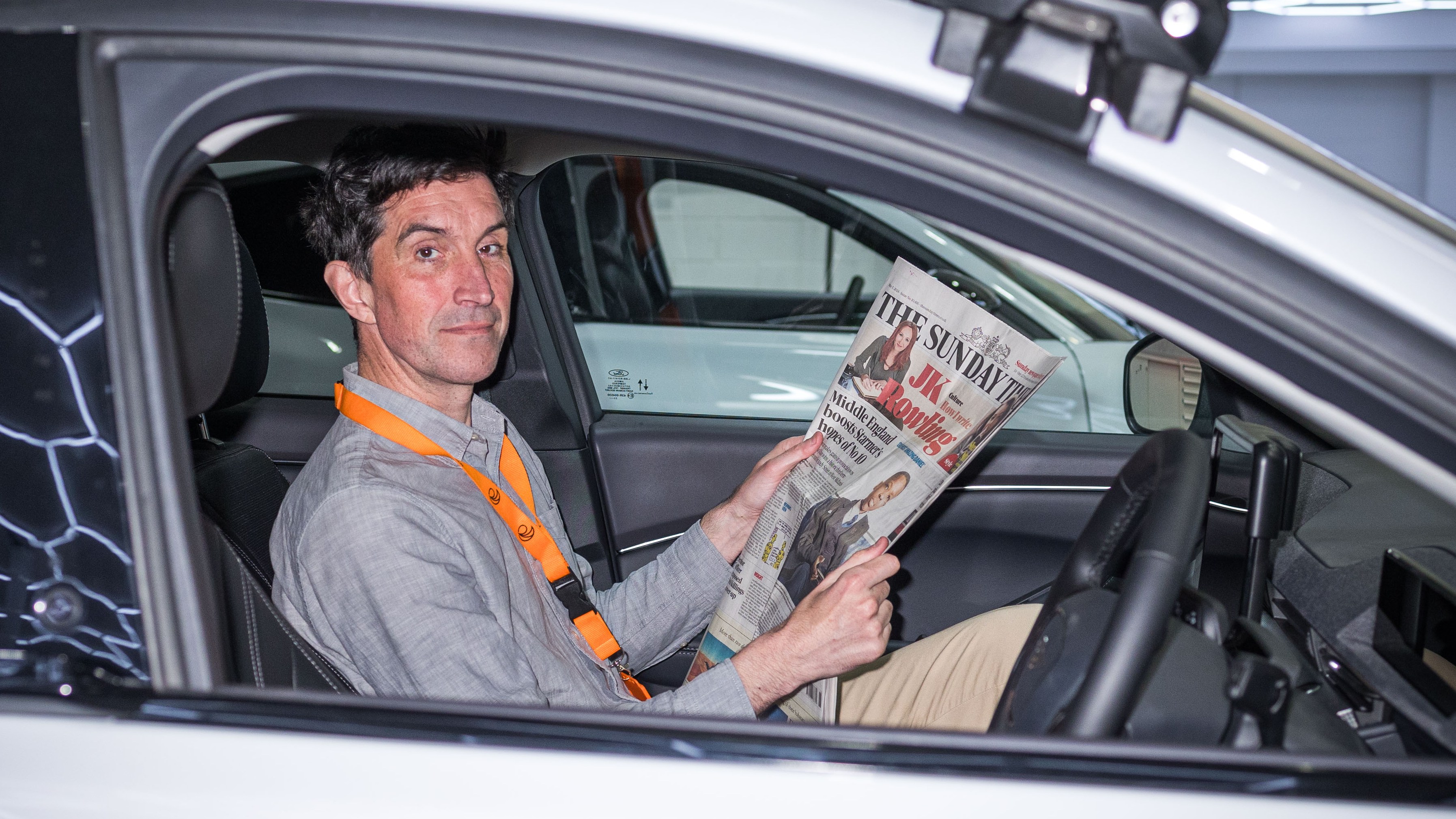 Matt Rudd relaxes in Wayve’s driverless Jaguar I-Pace