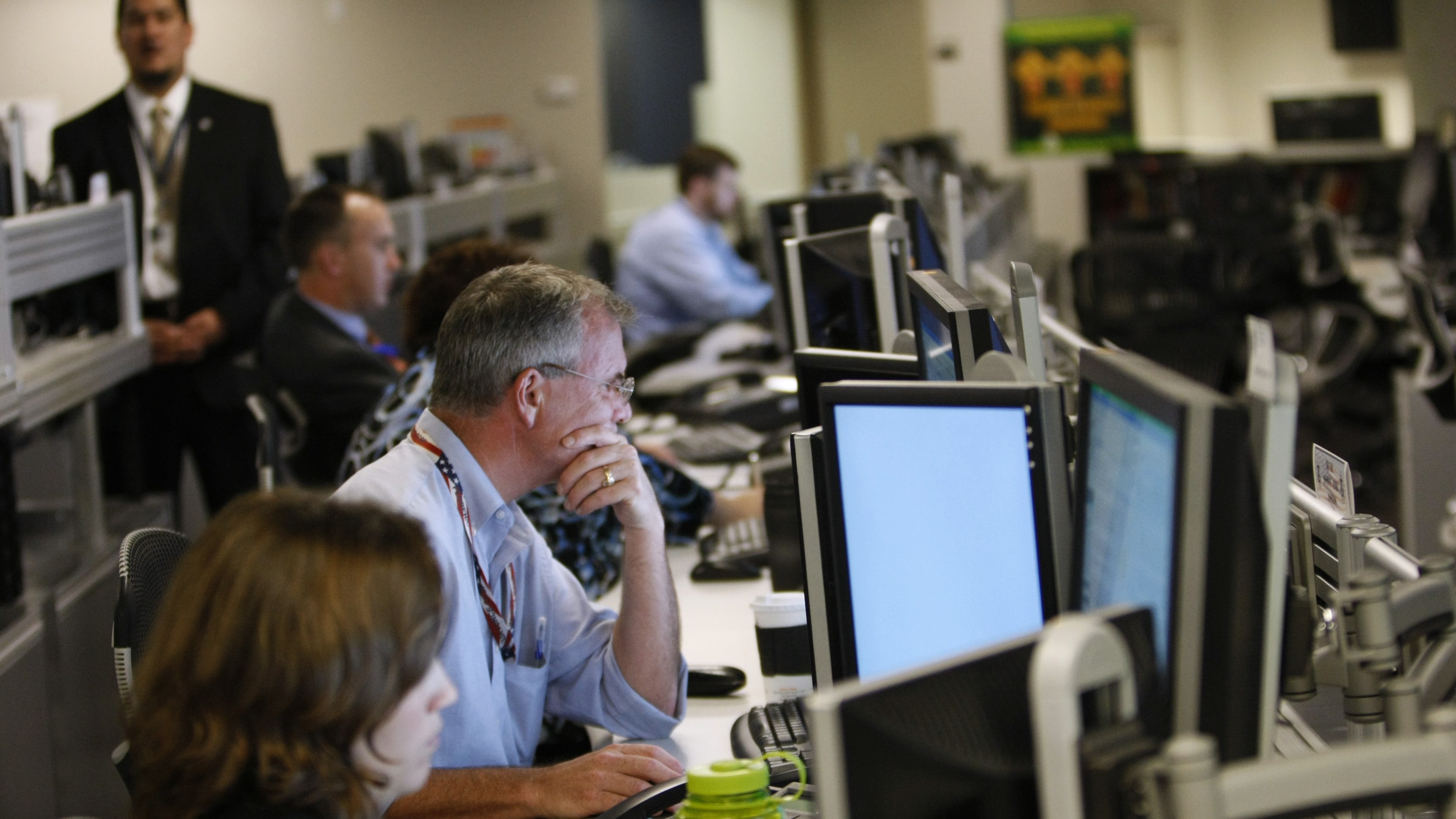 US department of homeland security analysts work at the National Cybersecurity & Communications Integration Centre located in Arlington, Virginia