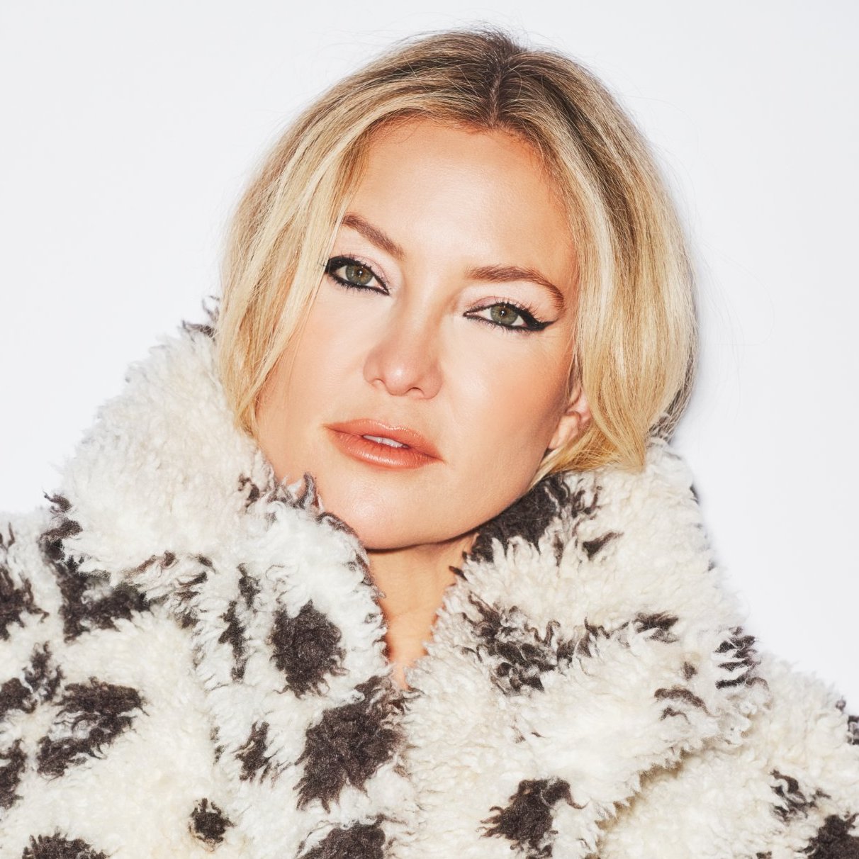 Kate Hudson delivers a serviceable impression of someone giving it her all