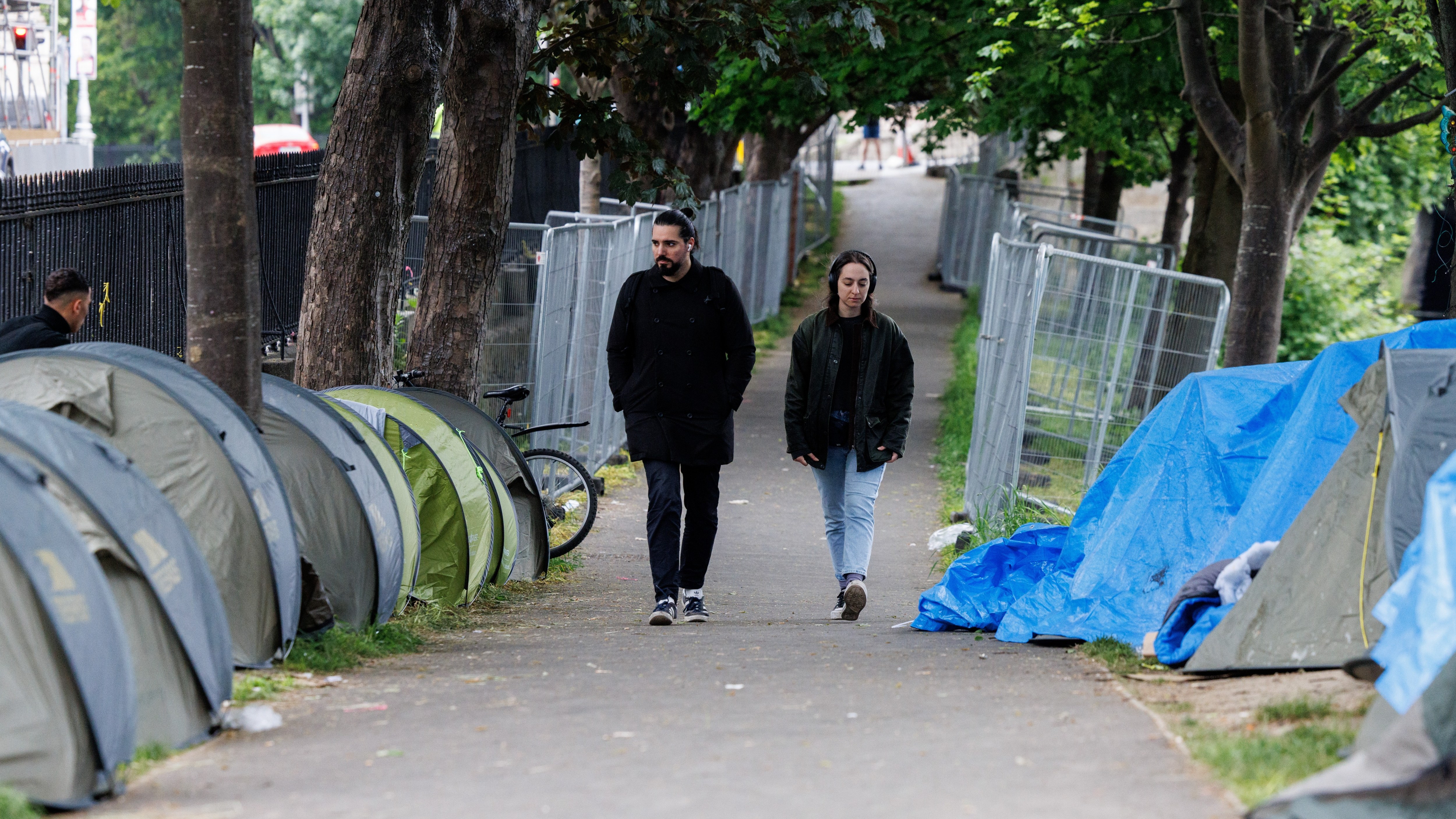 Asylum seekers sleep in tents in a makeshift camp along the Grand Canal in Dublin