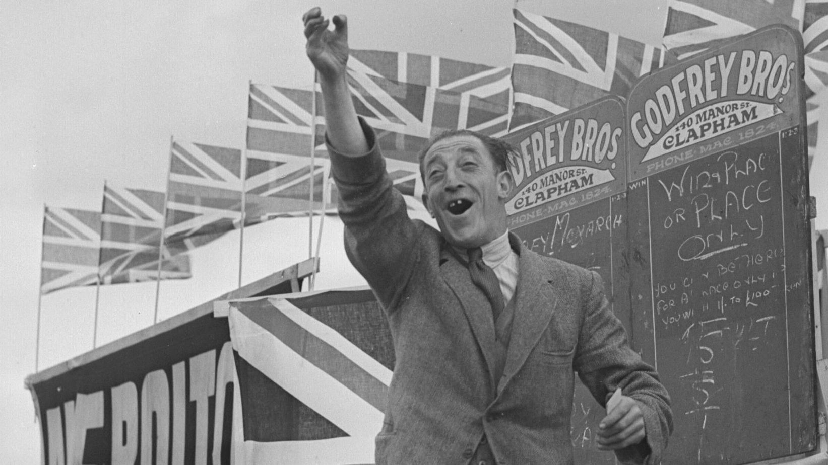 A bookmaker shouts out his odds at Epsom in 1946, the first Derby since the Second World War