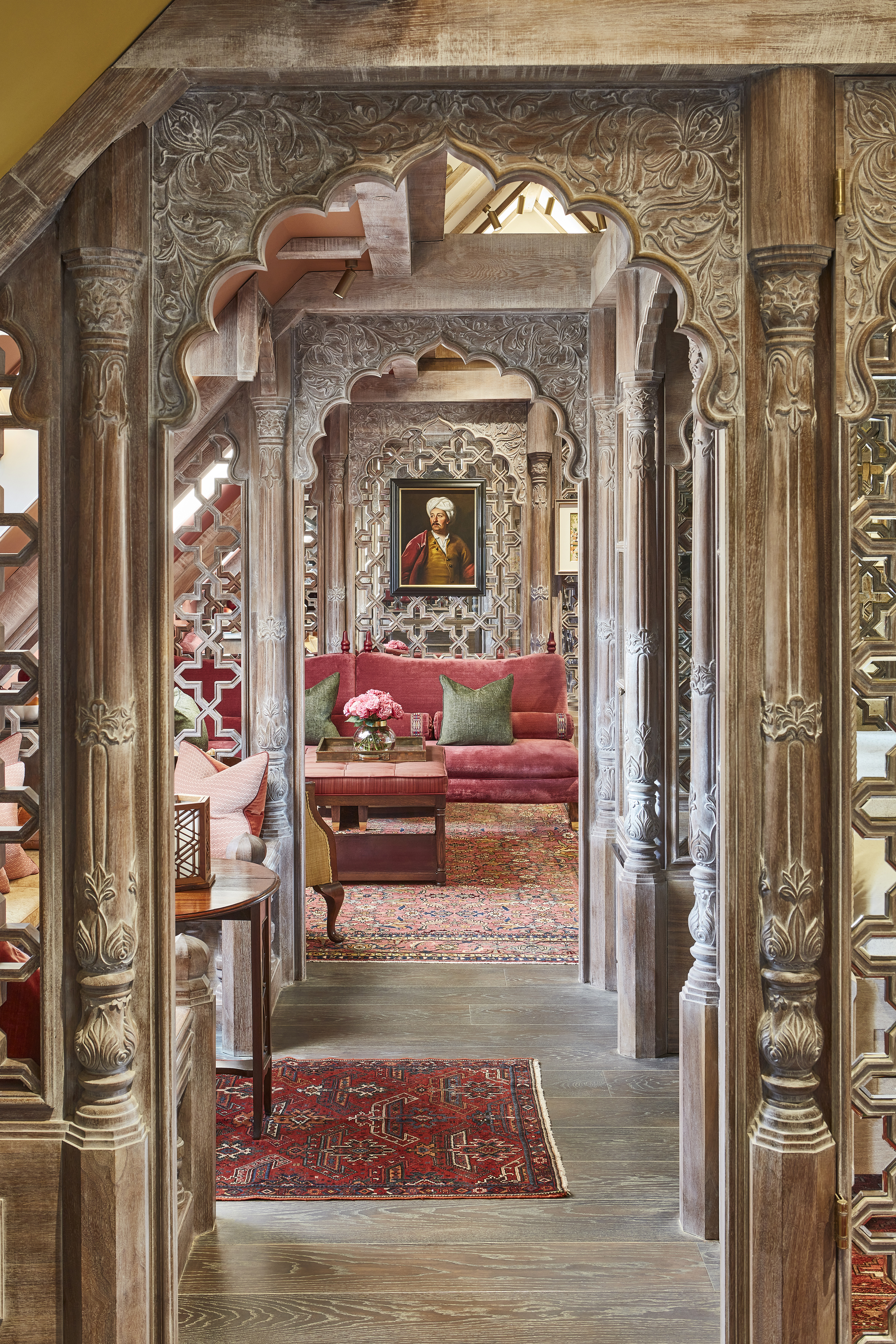 Furnishings include carpets from Afghanistan and Mogul portraits