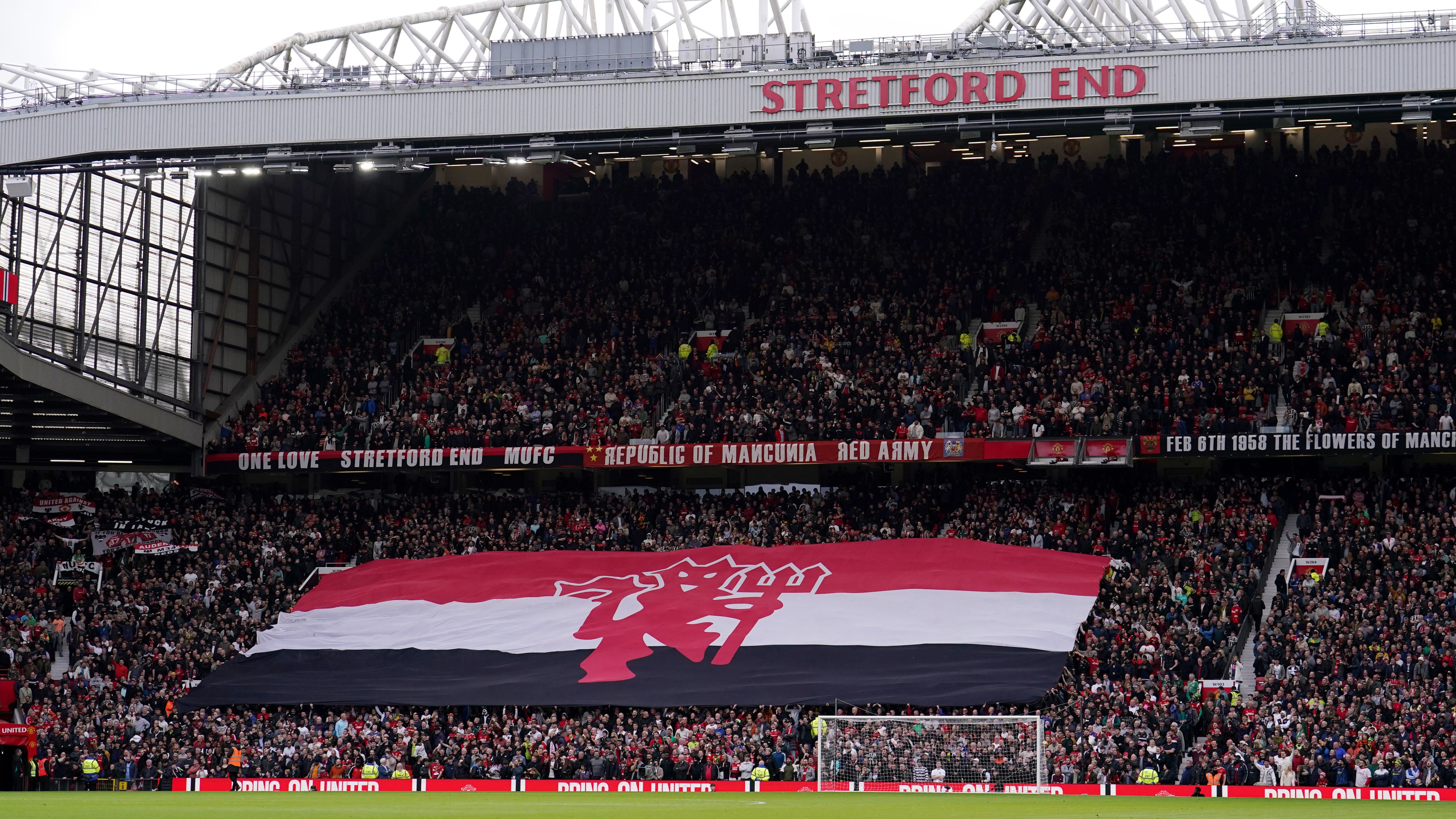 United hand CCTV footage to police as two home fans arrested over tragedy chants