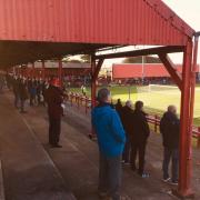 A socially distanced crowd at Workington Reds v Mossley, which features in Daniel Gray's book The Silence of the Stands