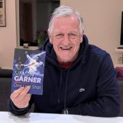 Simon Garner with his book