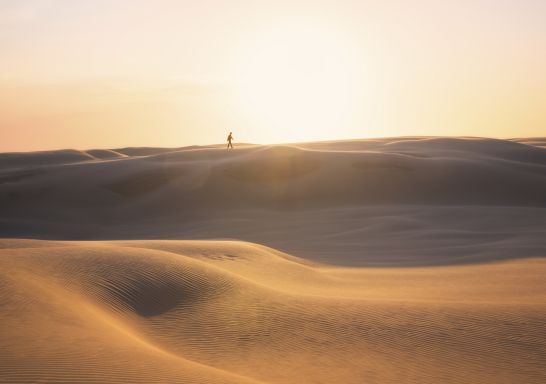 Sun setting over the Stockton Sand Dunes in Port Stephens