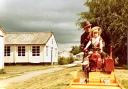 Jan Glaz and Rebecca Griffiths as a child on the site of the Polish Camp