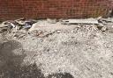 MESS: The suspected asbestos pile in Nailsworth Close in Worcester has been reported to Worcestershire Regulatory Services by Cllr Jill Desayrah