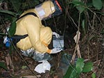 Thumbnail of Field watertight clothes equipped with air filtration equipment, used for high-risk wild animal necropsy. Odzala National Park Republic of Congo, June 2003. Photo: P. Rouquet.