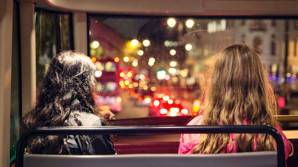 Two people on a bus (Credit: Getty Images)