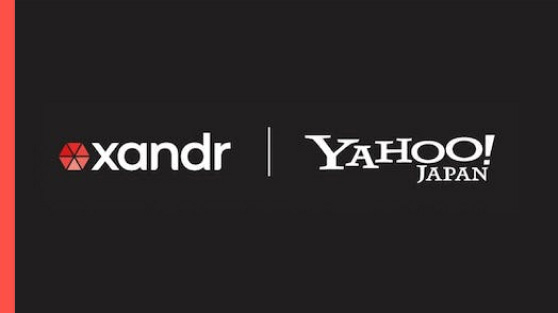 Xandr logo on the left and Yahoo! JAPAN logo on the right over a black background.