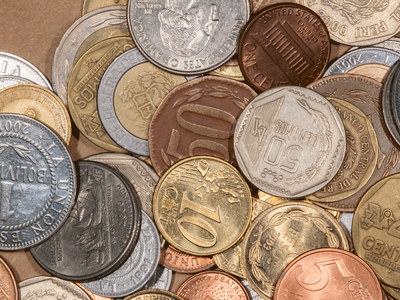 Differrent currencies in coins Tacio-Philip-Sansonovski shutterstock 385521172 - Credit: Tacio-Philip-Sansonovski shutterstock - 385521172