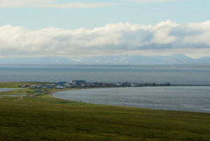 The traditional Iñupiaq village of Teller sits on a long spit of land separating two bodies of water off Western Alaska’s Seward Peninsula. The bay of Port Clarence is west toward the Bering Sea, and Grantley Harbor is inland to the east. (Photo by Berett Wilber for Northern Journal)