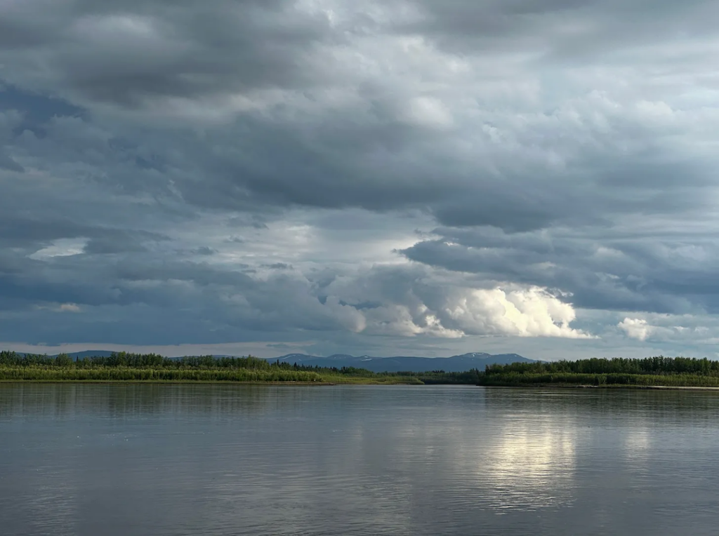 A thunderstorm brews over the Middle Yukon, between the villages of Tanana and Ruby. (Photo by Bathsheba Demuth for Northern Journal)