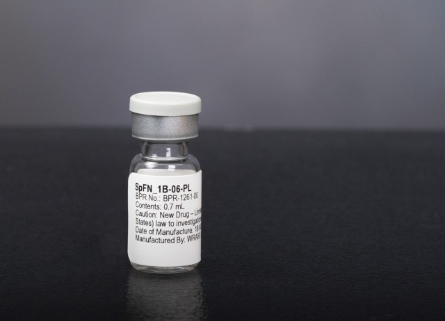 A vial of spike ferritin nanoparticle (SpFN), WRAIR’s COVID-19 vaccine. Built on a ferritin platform, the vaccine offers a flexible approach to targeting multiple variants of the virus that causes COVID-19 and potentially other coronaviruses as well. (U.S. Army photo by Mike Walters/ RELEASED)