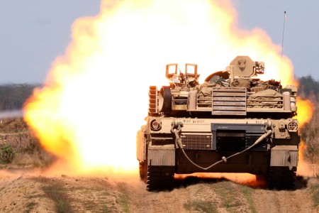 Army M1A2 Abrams tank crews assigned to the 1st Battalion, 8th Cavalry Regiment, 1st Cavalry Division, supporting 4th Infantry Division, zero their tank cannons in preparation for a live-fire qualification at Pabrade Training Area, Lithuania, Aug. 12, 2023.