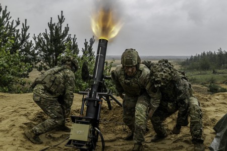Army mortarmen assigned to the 1st Battalion, 506th Infantry Regiment ‘Red Currahee,’ 1st Infantry Brigade Combat Team, 101st Airborne Division, supporting the 4th Infantry Division, fire an M120A1 120 mm towed mortar system during a fire support coordination exercise at Camp Adazi, Latvia, Aug. 28, 2023.