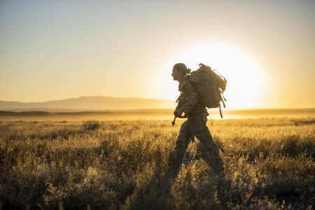 Idaho Army National Guard Staff Sgt. Lauren Cox completes an 11-mile ruck with a 40-pound weight in a pack during the Army National Guard Best Warrior Competition near Boise, Idaho, Sept. 16, 2023. During the competition, 15 Idaho National Guardsmen participated in intensified tests that challenged candidates physically and mentally while evaluating the ability to shoot, move, communicate and survive.