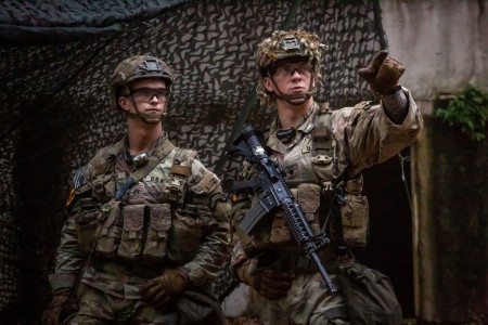 Sgt. Jake Phillips, a native of West Chester, Pennsylvania, and Spc. Chancellor McGuire, a native Georgetown, Texas, representing the U.S. Army Special Operations Command, prepare to evacuate a casualty during the 2023 Army Best Squad Competition at Fort Stewart, Georgia, Sept. 28, 2023.