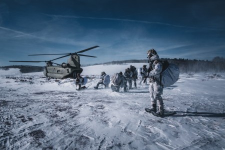A group of Green Berets assigned to 10th Special Forces Group (Airborne) return to base after completing their first reconnaissance mission during Cold Weather Training in the mountains of Colorado, Jan. 16, 2024. During their CWT, these Green Berets will complete different missions that test their knowledge on how to complete their normal mission set while being exposed to freezing environments. 