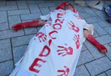 One of the about 20 mock bodies in the Gaza die-in at Te Komititanga Square today