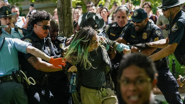 Police officers arrest a demonstrator during a protest against the war in Gaza at Emory University on April 25, 2024, in Atlanta, Georgia. 