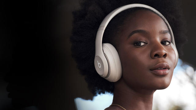 Woman wearing Beats Studio Pro 