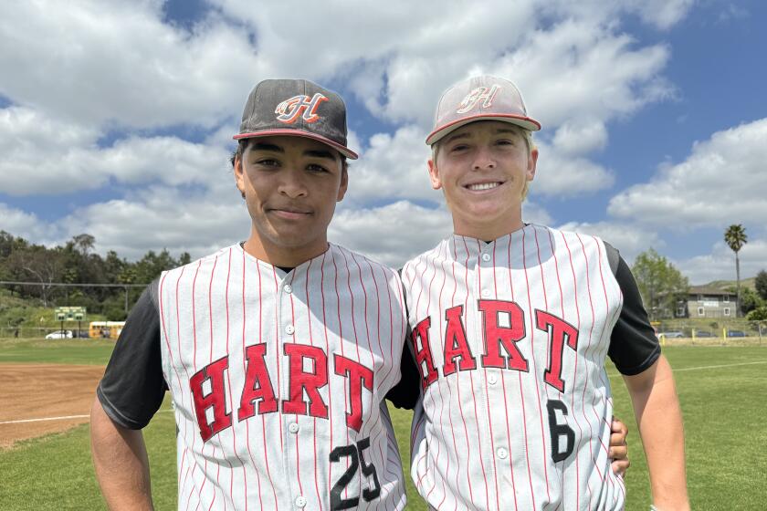 Left-hander Tristan Purfoy (left) and right-hander Ian Edwards both throw submarine-style for Hart.