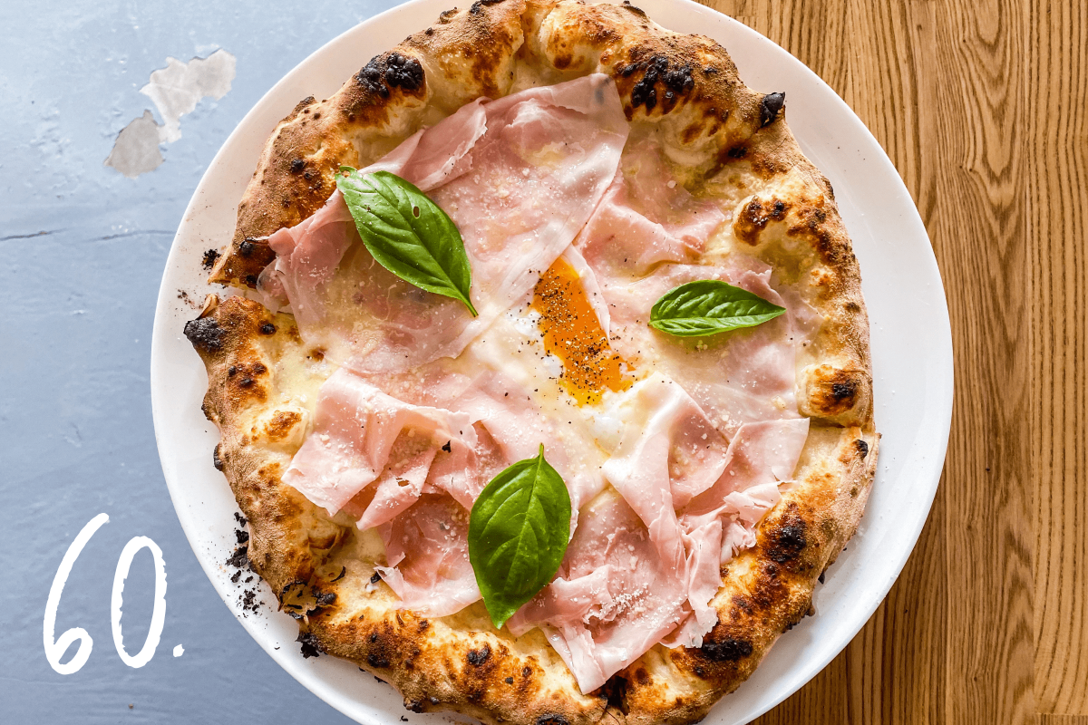 #60: The Bismarck pizza with ham and an egg yolk