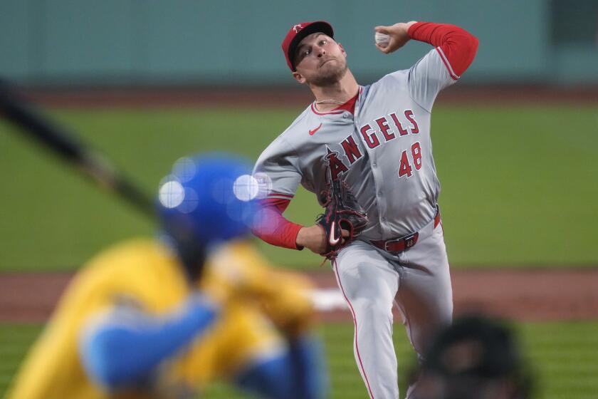 Los Angeles Angels pitcher Reid Detmers delivers during the first inning of the team's baseball.