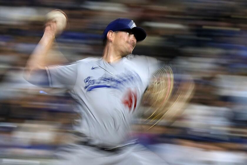 Los Angeles Dodgers pitcher Daniel Hudson throws during the ninth inning of a baseball game against the Kansas City Royals Friday, June 30, 2023, in Kansas City, Mo. (AP Photo/Charlie Riedel)