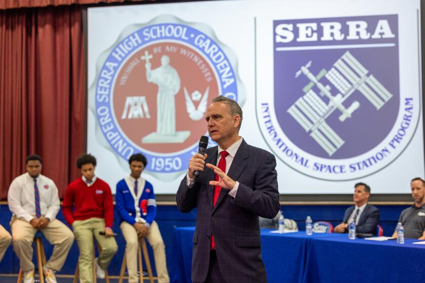 Gardena, CA - April 19: Dr. John Moran, President of Junipero Serra High School, introduces the Junipero Serra High School Space Team, shown at left, who participated in The International Space Station Program (ISSP). They are celebrated during a pep rally and being recognized overall for its achievements in Applied Math, Science and Engineering. The space science team launched an experiment aboard the SpaceX Falcon 9 CRS-30 Rocket to the International Space Station from the Kennedy Space Center in Florida. Junipero Serra High School is one of only nine high schools in the United States to achieve this. The Serra students are being lauded on the Senate Floor by Sen. Steven Bradford (D-Gardena) and the school is being recognized overall for its achievements in Applied Math, Science and Engineering. Photo taken in Junipero Serra High School in Gardena Friday, April 19, 2024. (Allen J. Schaben / Los Angeles Times)