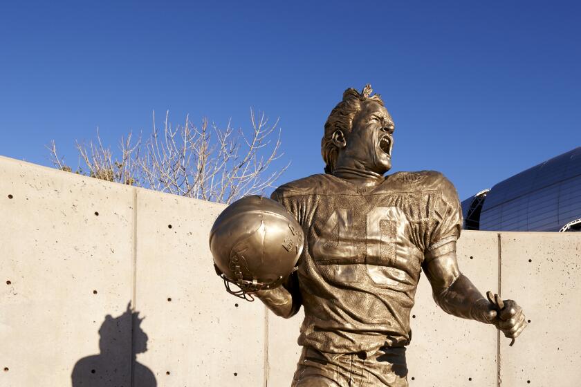 Closeup of statue of former Arizona Cardinals player Pat Tillman