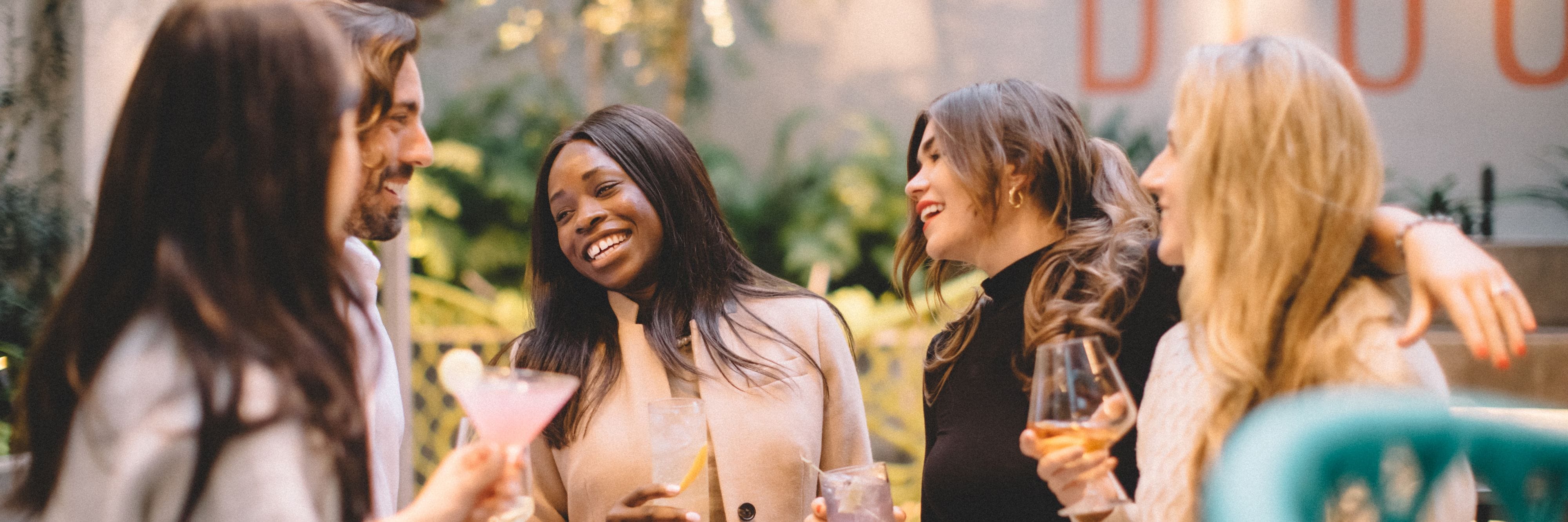 Group of friends enjoying cocktails