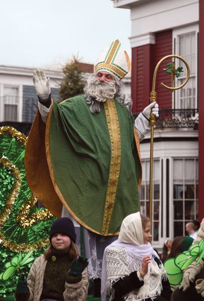 Parade participant dressed as Saint Patrick waving to the crowd during the St. Patrick's Day Parade in Boston, Massachusetts, U.S. on March 16, 2008.