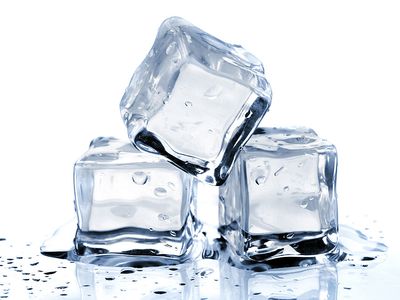 Ice cubes on white background. (frozen; freeze; ice cube)