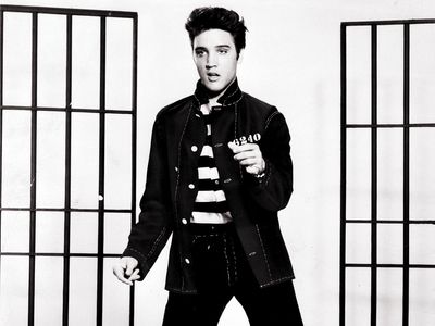 Publicity still of Elvis Presley in Jailhouse Rock in 1957. (cinema, movies, motion pictures, film)