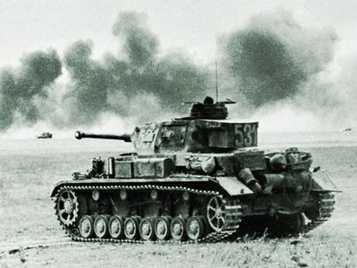 Tanks of World War II. (Left) German Pz. IV (foreground) and Pz. III (background) tanks, 1942.