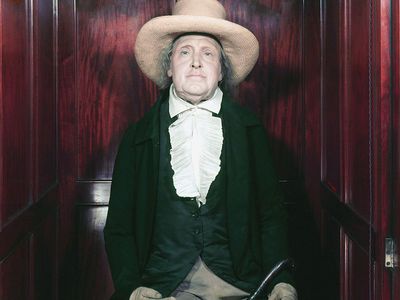 British philosopher and economist Jeremy Bentham's preserved skeleton in his own clothes and surmounted by a wax head, at University College, London, England.