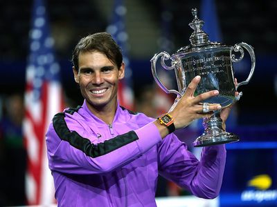 Rafael Nadal of Spain celebrates with the championship trophy during the trophy presentation ceremony after winning his Men's Singles final match against Daniil Medvedev of Russia at the 2019 US Open at the USTA Billie Jean King National Tennis Center...