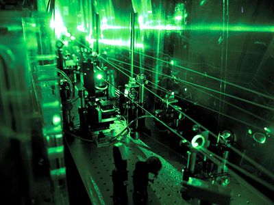 Part of the laser system developed for the measurement of the proton radius. equency doubling optics converting the disk laser pulses from 1030 nm (infrared) to 515 nm (green) by means of LBO crystals.