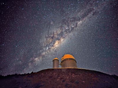 The ESO 3.6-metre telescope at La Silla, during observations in Chile. Milky Way galaxy in sky. (European Southern Observatory)