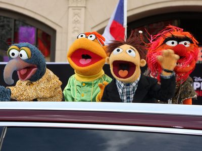 Sam the Eagle, Fozzie, Walter, Animal at the "Muppets Most Wanted" - Los Angeles Premiere at the El Capitan Theater on March 11, 2014 in Los Angeles, CA