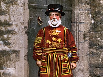 A Yeoman Warder of the guard (Beefeater) at the Tower of London in London, England.