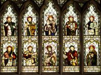 Stained glass window showing ten Christian saints. St Peters Church, Cound, Shropshire, England.