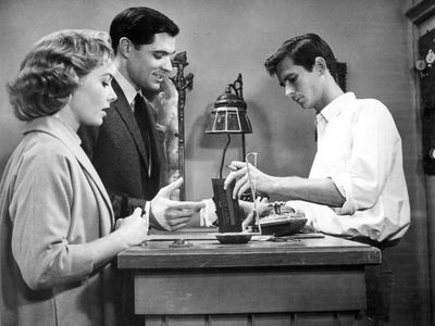 American actors (from left) Vera Miles, John Gavin, and Anthony Perkins in "Psycho" (1960); directed by Alfred Hitchcock.