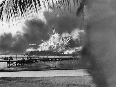 pg 159Explosions rock American base at Pearl Harbor following surprise Japanese attack, December 7, 1941.To Japan, an eventual attack on the United States, specifically on the island outpost of Hawaii, was aninevitable beginning of military action agains