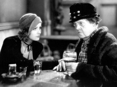 Greta Garbo (left) and Marie Dressler in the motion picture film "Anna Christie" (1930); directed by Clarence Brown. (movies, cinema)